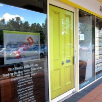 Ray White Austral/Green Valley Logo