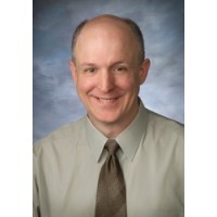 Richard Downs, DDS, FAGD, FICOI Logo