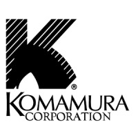 Komamura Corporation Logo