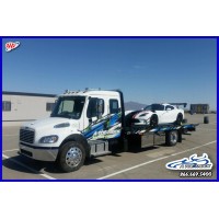 A Toe Truck Towing & Recovery Logo