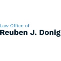 Law Offices of Reuben J. Donig Logo