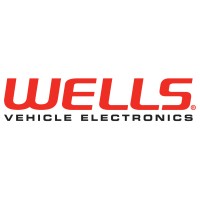 WELLS VEHICLE ELECTRONICS, L.P Logo