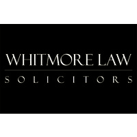 WHITMORE LAW Ltd. Logo