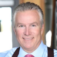 The Greg Wells Team Logo