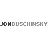 Jon Duschinsky Inc Logo