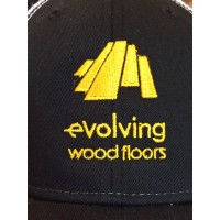 Evolving Wood Floors Logo