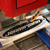 Jennerjahn Machine Inc Logo