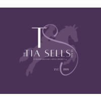 The TIA SELLS Team at Keller Williams Capital District Logo