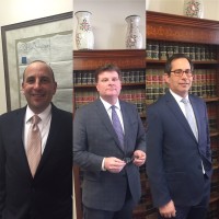 Talkin Muccigrosso & Roberts, LLP Logo