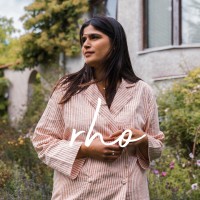rho organic loungewear Logo