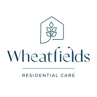 Wheatfields Residential Care Logo