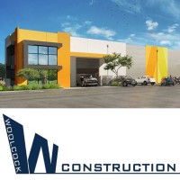 WOOLCOCK CONSTRUCTION Logo