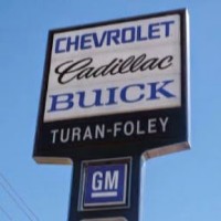 Turan Foley Chevrolet Cadillac Buick Logo
