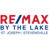 RE/MAX by the Lake Logo