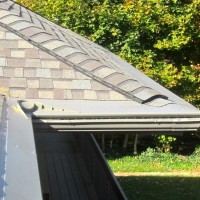 Dennison Exterior Solutions Logo