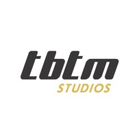 TBTM Studios (powered by AMP Global Technologies) Logo