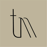 TM Associados Logo